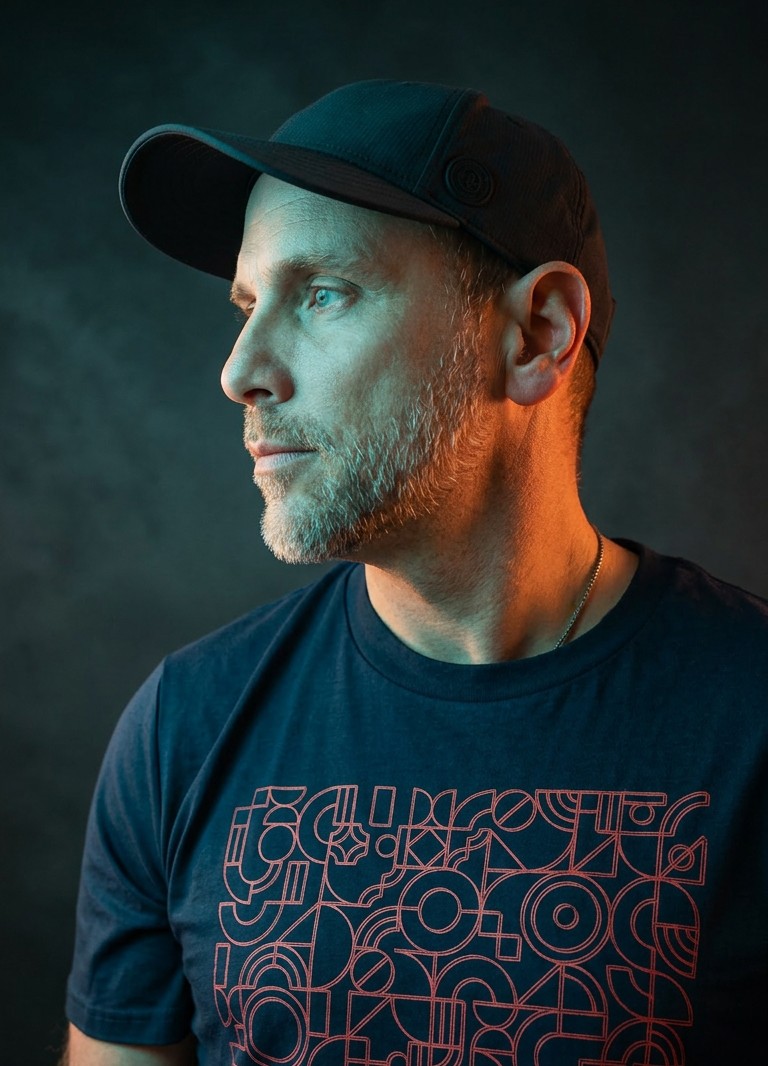 Fonkah in teal and amber cinematic lighting